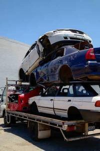 Old scrap cars stacked together